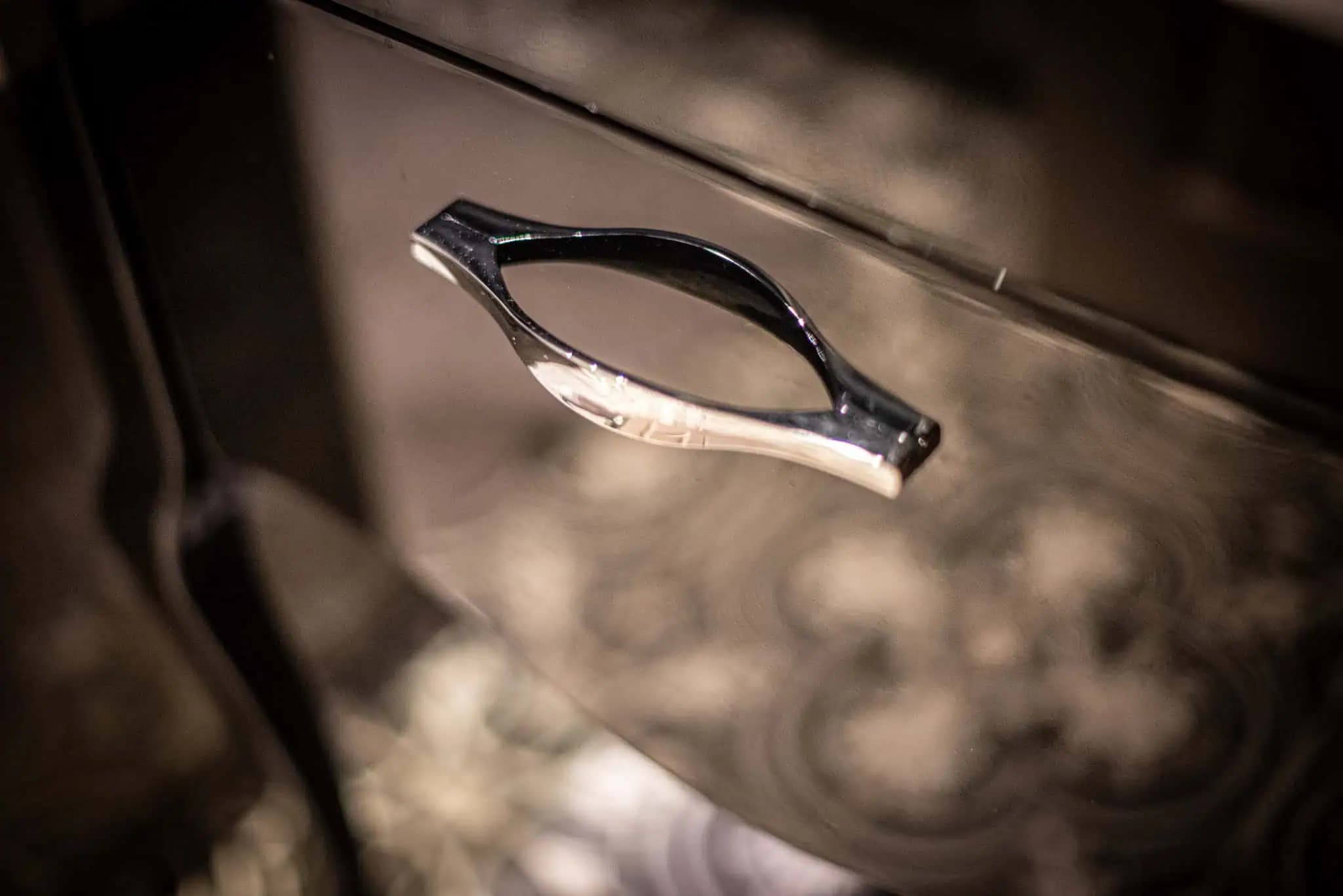 Close view of a bathroom cabinet handle inside Luxurious Home.