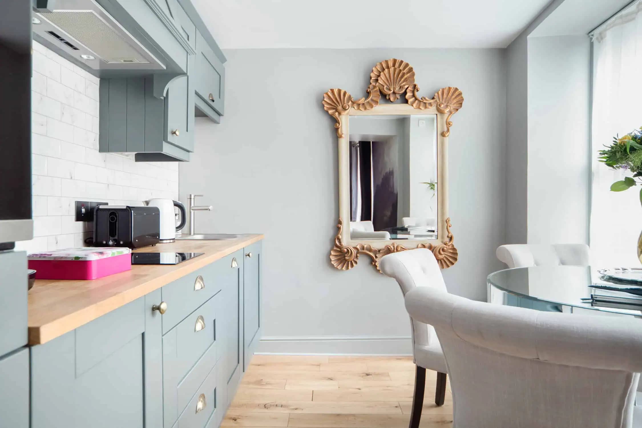 Pale fitted kitchen inside Romantic Stay.