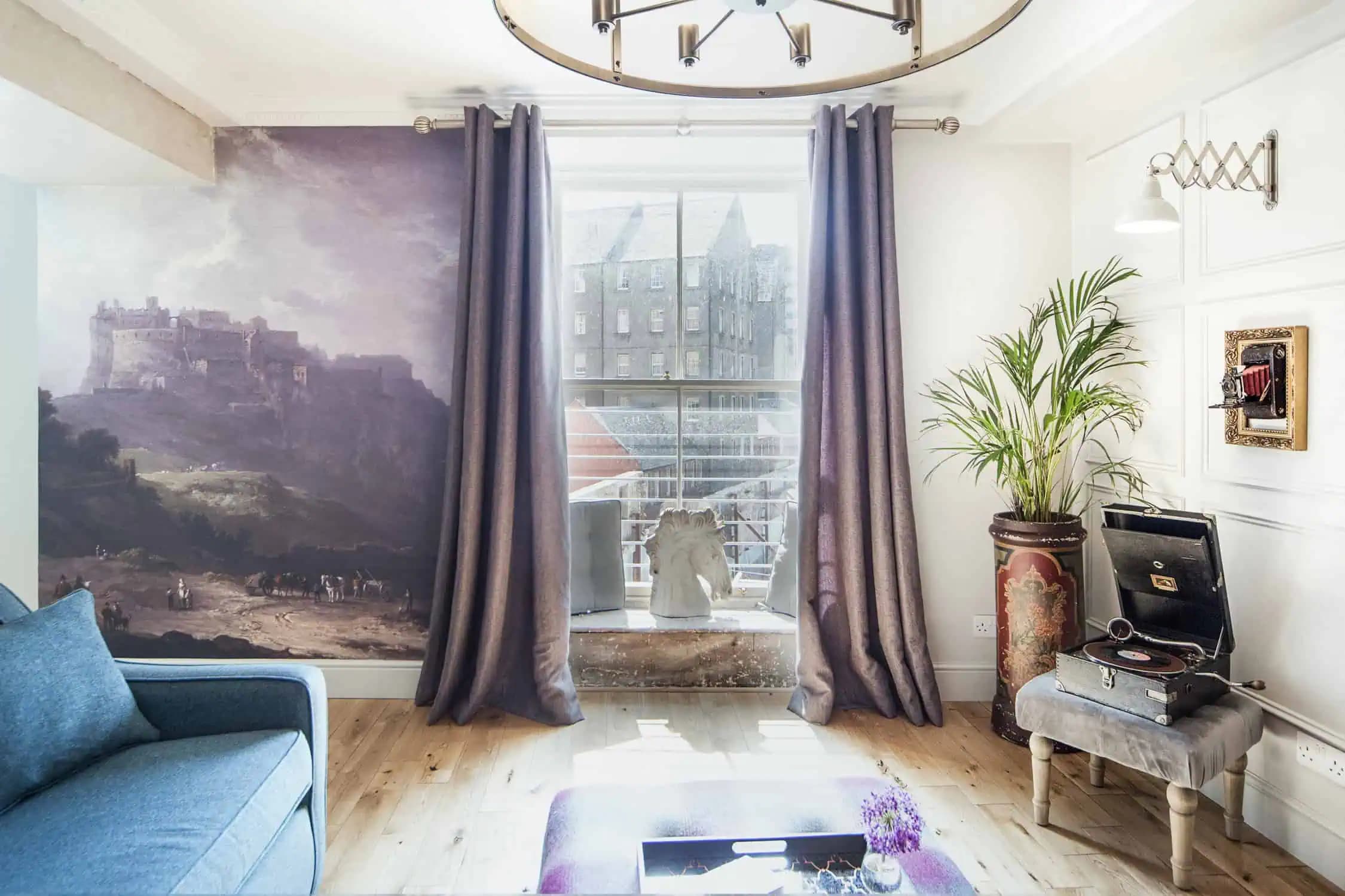 Living room window and record player inside Romantic Stay.