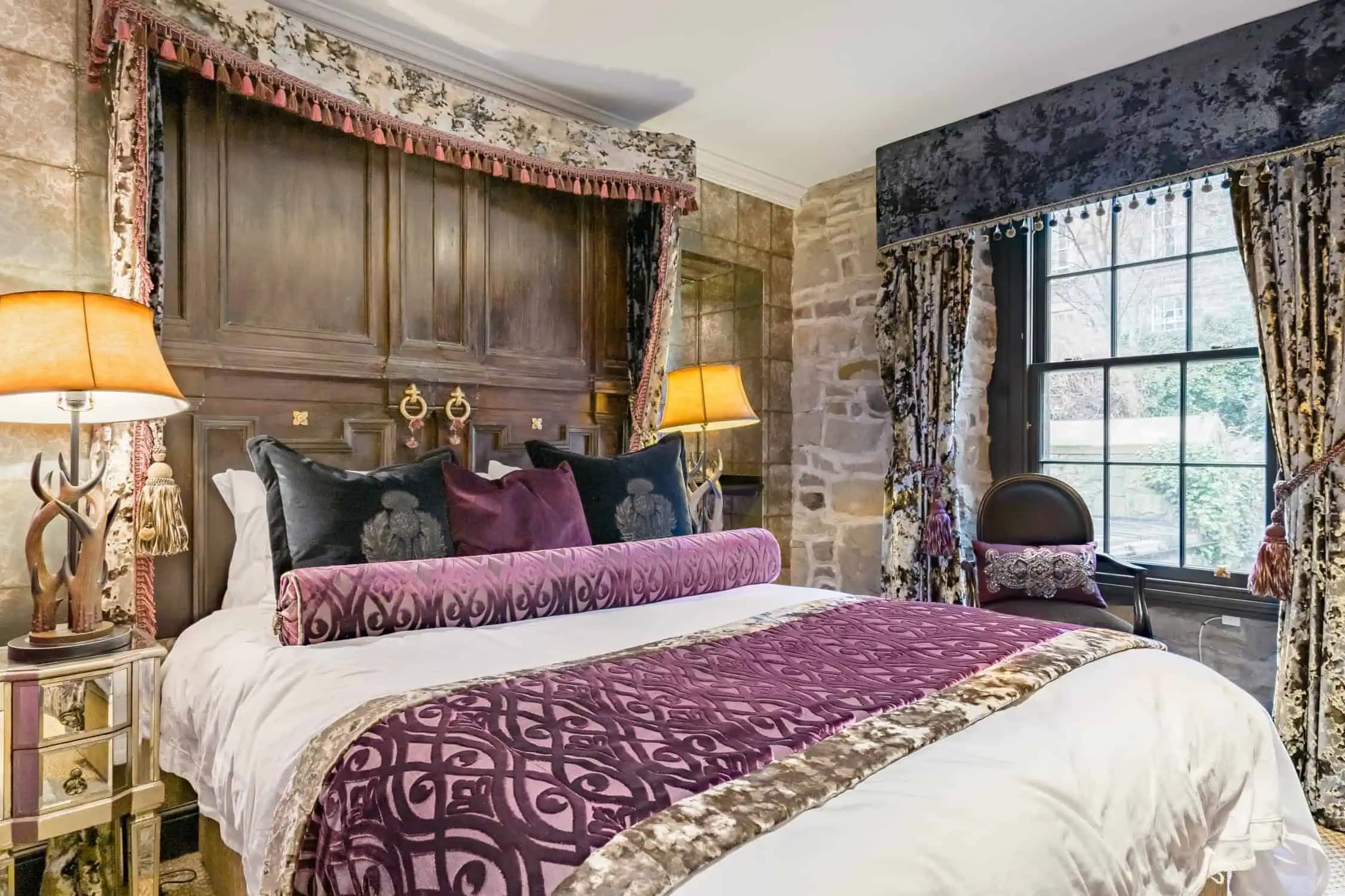 Draped bedroom inside Wee Witchery at Edinburgh Castle.